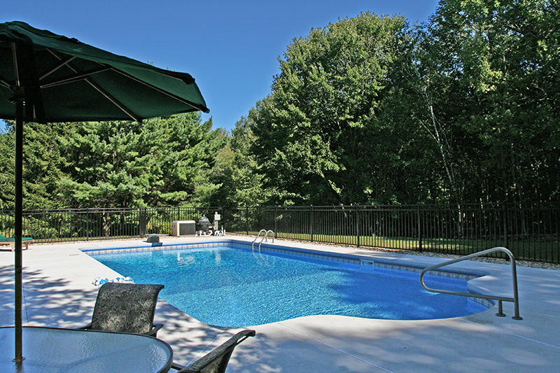 Swimming pool and hand finished concrete project example 180